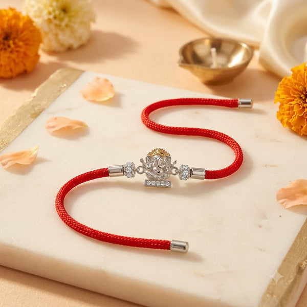 Silver Ganesh Rakhi with Red Thread