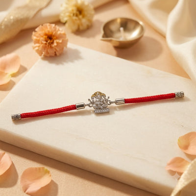 Silver Ganesh Rakhi with Red Thread
