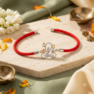 Silver Peacock Rakhi with Red Thread