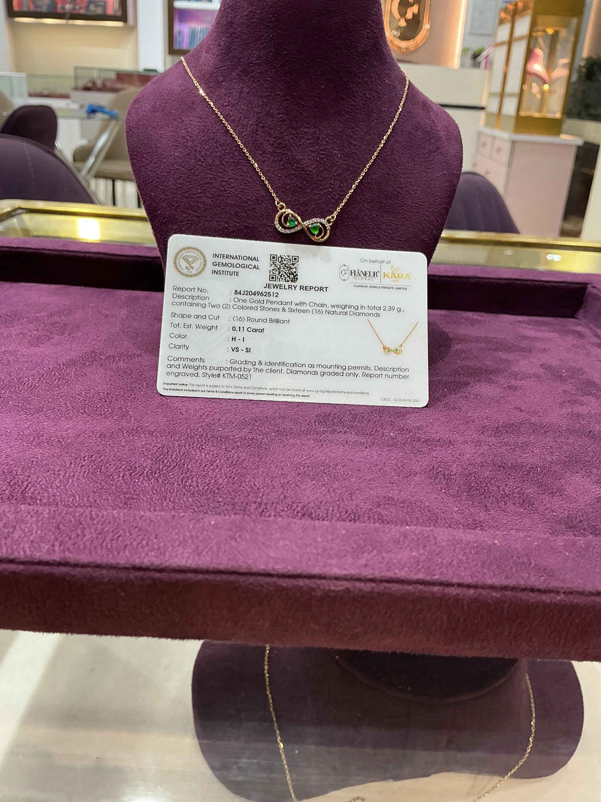 Gold Infinity Pendant Necklace with Green Gemstones & Diamonds