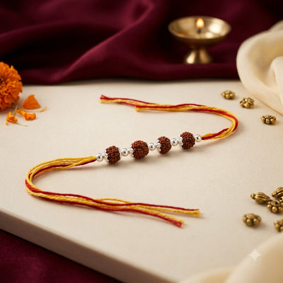 925 Silver Rudraksha Rakhi with Red & Yellow Thread