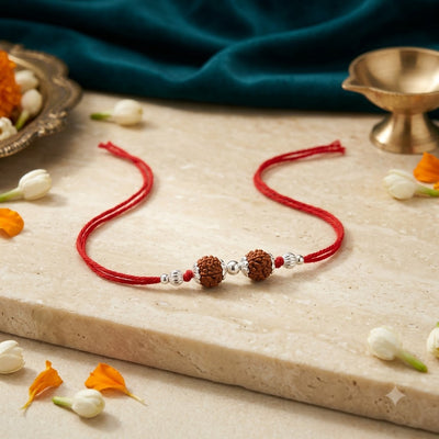 925 Silver Rudraksha Rakhi – Minimal Red Thread Design