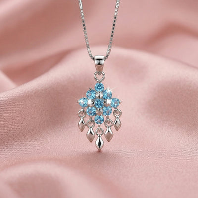 92.5 Fine Silver Blue Topaz and White Stone Floral Pendant